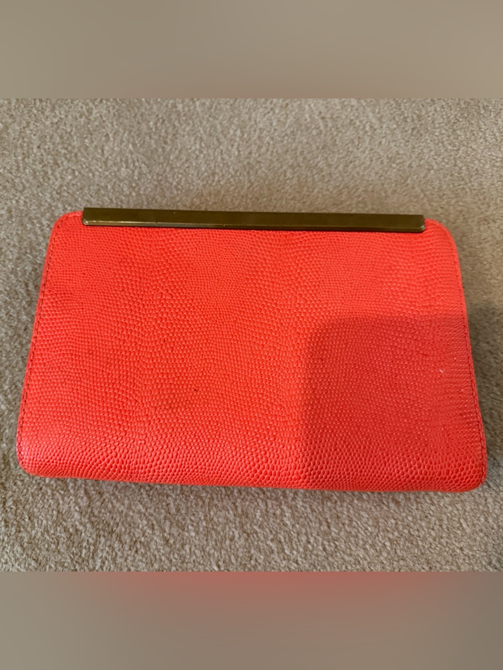 Red Textured Clutch with Gold Bar Accent